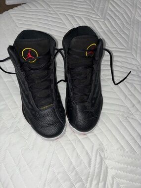 Jordan Black Sneakers with Red Jumpman and Yellow Trim